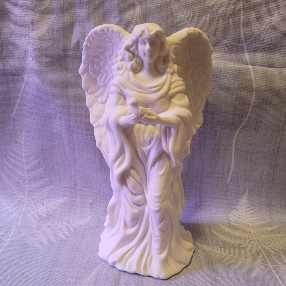 Angel Figurine holding a dove 🕊